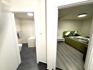 Postel nebo postele na pokoji v ubytování Hotel Labe