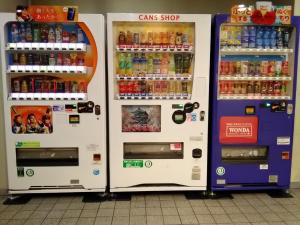 two refrigerators with drinks in them in a store at Smile Hotel Hirosaki - Vacation STAY 40509v in Hirosaki