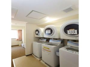 a room with a hospital room with machines at Smile Hotel Hirosaki - Vacation STAY 40509v in Hirosaki