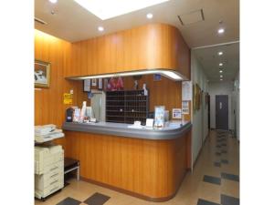 a restaurant with a counter in a hallway at Smile Hotel Hirosaki - Vacation STAY 40509v in Hirosaki