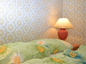Katil atau katil-katil dalam bilik di Spacious group house in the Harz region