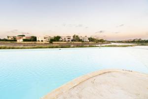 The swimming pool at or close to MARASSI VERONA VILLA by ELEGANT Hospitality