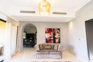 A seating area at MARASSI VERONA VILLA by ELEGANT Hospitality