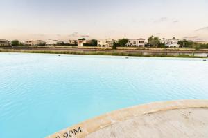 The swimming pool at or close to MARASSI VERONA VILLA by ELEGANT Hospitality