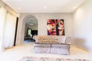 A seating area at MARASSI VERONA VILLA by ELEGANT Hospitality