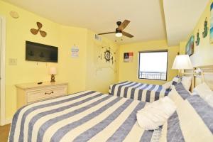 Uma cama ou camas num quarto em Paradise Ocean View at Top Resort w Lazy River