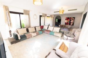 A seating area at MARASSI VERONA VILLA by ELEGANT Hospitality
