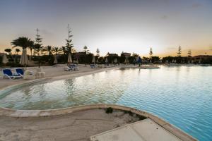 The swimming pool at or close to MARASSI VERONA VILLA by ELEGANT Hospitality
