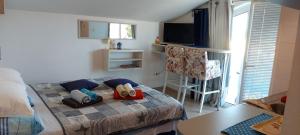 Posteľ alebo postele v izbe v ubytovaní Charlie Apartments