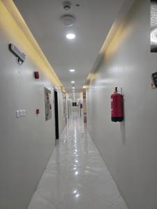 Fotografija v galeriji nastanitve فندق كنوز العنود مكة للغرف والشقق المفروشة توصيل مجاني للحرم - Knoz Al Anood Hotel Makkah For Furnished Rooms and Apartments Free Shuttle Service v Meki