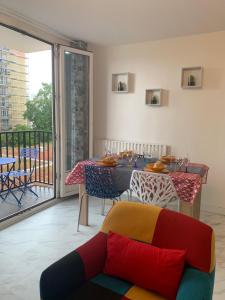 Χώρος καθιστικού στο Chambres ou Appartement Cosy