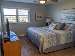 Postel nebo postele na pokoji v ubytování 143 Capt John Fripp Villa + 26 fotografií