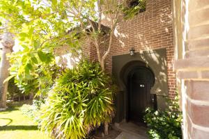 A garden outside MARASSI VERONA VILLA by ELEGANT Hospitality