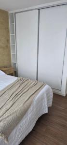 En eller flere senge i et værelse på Departamento Semipiso nuevo en Mar del Plata