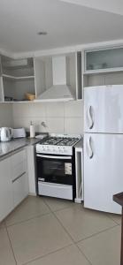 Køkken eller tekøkken på Departamento Semipiso nuevo en Mar del Plata