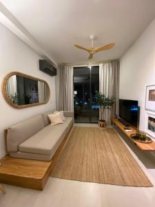 Un televizor și/sau centru de divertisment la Cozy Flat in Pozos Colorados