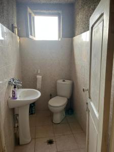 Un baño de Lorenzo Budget Hostel