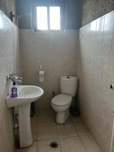 Un baño de Lorenzo Budget Hostel