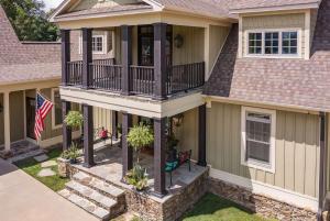 an aerial view of a house with a balcony at French Quarter - New Orleans Charm in the Mountain in Mentone