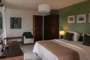 Katil atau katil-katil dalam bilik di Hotel Maitei