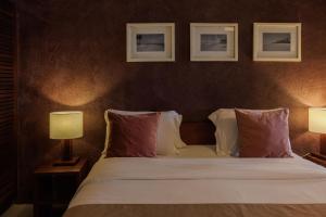 Katil atau katil-katil dalam bilik di Hotel Maitei