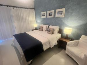 Katil atau katil-katil dalam bilik di Hotel Maitei