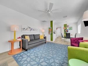 a living room with a couch and two chairs at Drew 253 Mesa in Mesa