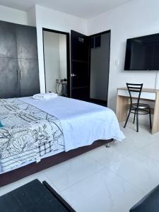 Postel nebo postele na pokoji v ubytování hotel royal fenix