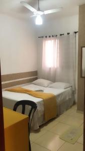 Giường trong phòng chung tại Hospedaria Ipiranga