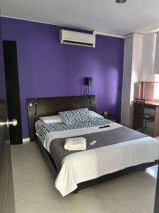 Postel nebo postele na pokoji v ubytování hotel royal fenix
