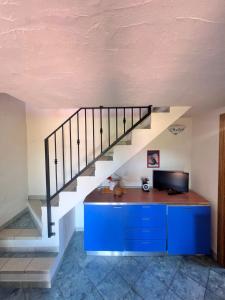 TV a/nebo společenská místnost v ubytování Tamerici House 1