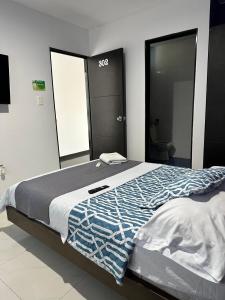 Postel nebo postele na pokoji v ubytování hotel royal fenix
