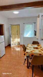 Kuchyň nebo kuchyňský kout v ubytování Apartments Nada