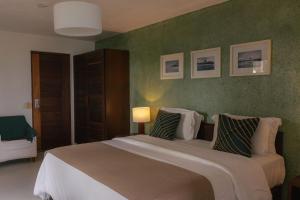 Katil atau katil-katil dalam bilik di Hotel Maitei
