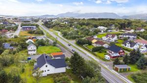 an aerial view of a small town with houses at Lofoten Apartment 02 in Leknes +7 photos