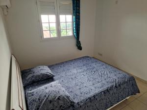 Postel nebo postele na pokoji v ubytování HARMONY Appart Type Penthouse avec vue imprenable