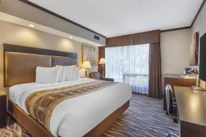 Postel nebo postele na pokoji v ubytování Best Western Wayside Inn