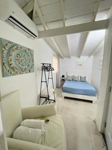 Ένα ή περισσότερα κρεβάτια σε δωμάτιο στο casa cerca de la playa céntrico +34 φωτογραφίες