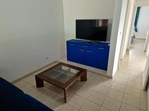 TV a/nebo společenská místnost v ubytování HARMONY Appart Type Penthouse avec vue imprenable