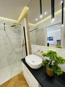Koupelna v ubytování Pino Resort 21 Gdańsk Wyspa Sobieszewska Sobieszewo + 13 fotografií
