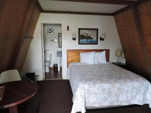 Postel nebo postele na pokoji v ubytování The Ranch Motel