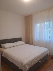 Postel nebo postele na pokoji v ubytování Apartments with parking spaces Palit, Rab - 14610