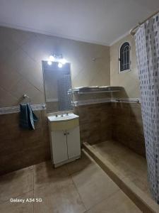 Koupelna v ubytování Alojamiento temporal Tandil MD&C + 15 fotografií