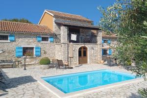 a house with a swimming pool in front of it at Family friendly house with a swimming pool Barban, Central Istria - Sredisnja Istra - 24471 in Barban