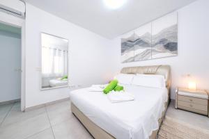 Posteľ alebo postele v izbe v ubytovaní Monarca House, Senator