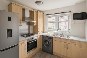 Η κουζίνα ή μικρή κουζίνα στο Elegant 2 Bed-Ground Floor