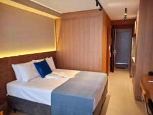 Postel nebo postele na pokoji v ubytování 2213 Sofisticação, conforto e tecnologia em Moema + 28 fotografií