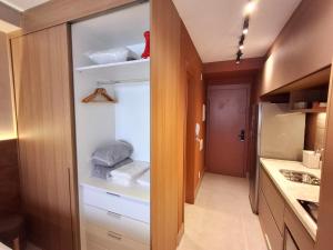 Kuchyň nebo kuchyňský kout v ubytování 2213 Sofisticação, conforto e tecnologia em Moema