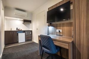 Cuina o zona de cuina de Doncaster Apartments by Nightcap Plus