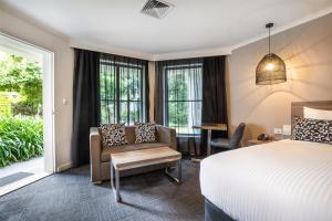 Llit o llits en una habitació de Doncaster Apartments by Nightcap Plus